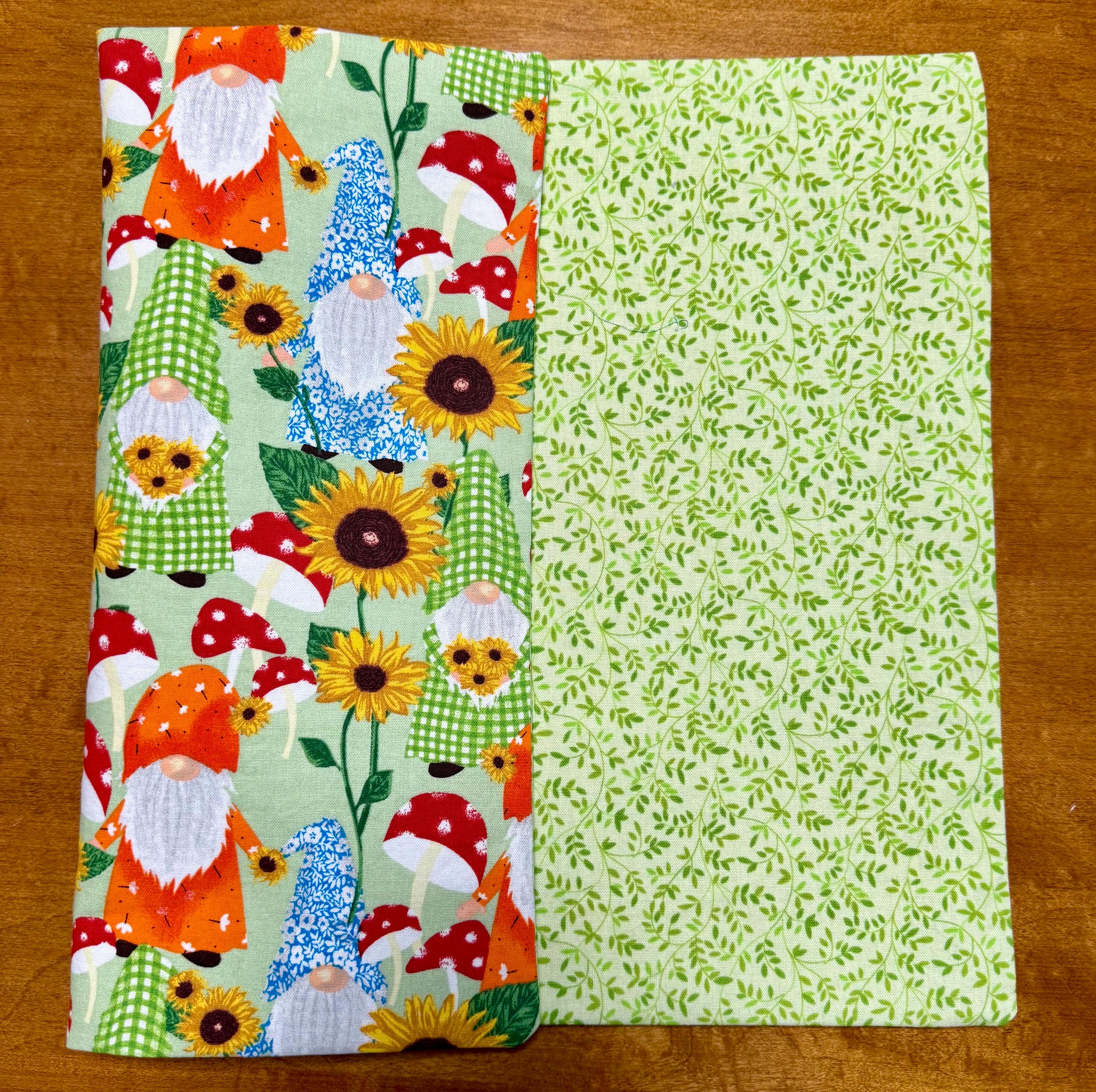 Set of Four Reversible Fabric Placemats / Spring Garden Gnomes & Small Leaf Pattern